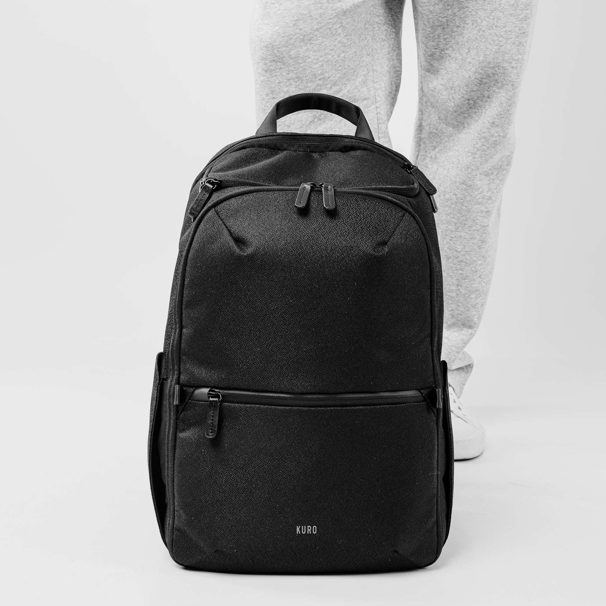 Everyday Workpack by Kuro Essentials, modern laptop backpack with multiple compartments and minimalist design.