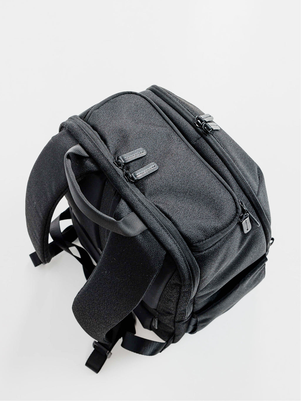 Top handle and main zipper detail on the Everyday Workpack